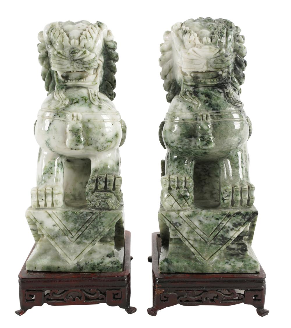 Appraisal: PAIR OF CHINESE CARVED STONE FOO LIONSeach with a wood