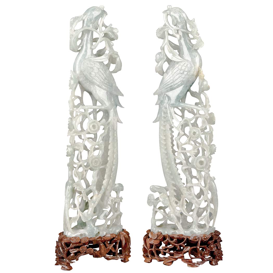 Appraisal: Pair of Chinese Jadeite Phoenix Qing Dynasty Each ornately carved