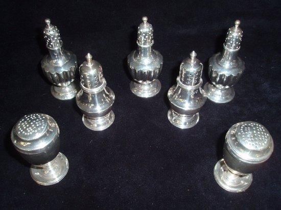 Appraisal: Three pepper pots Horace Woodward Co Ltd London of gadrooned