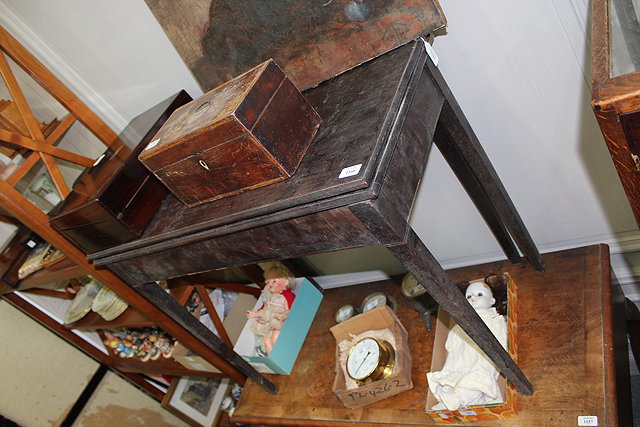 Appraisal: A GEORGIAN MAHOGANY FOLD OVER TEA TABLE standing on square