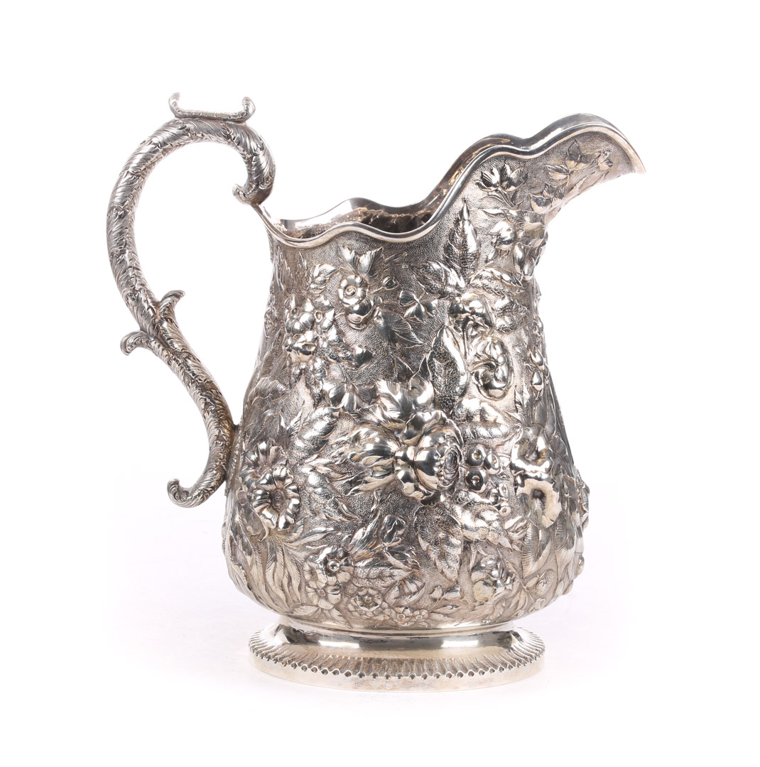 Appraisal: S Kirk Son repousse coin silver water pitcher - in