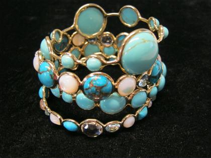 Appraisal: Group of karat yellow gold and blue hardstone bangle bracelets