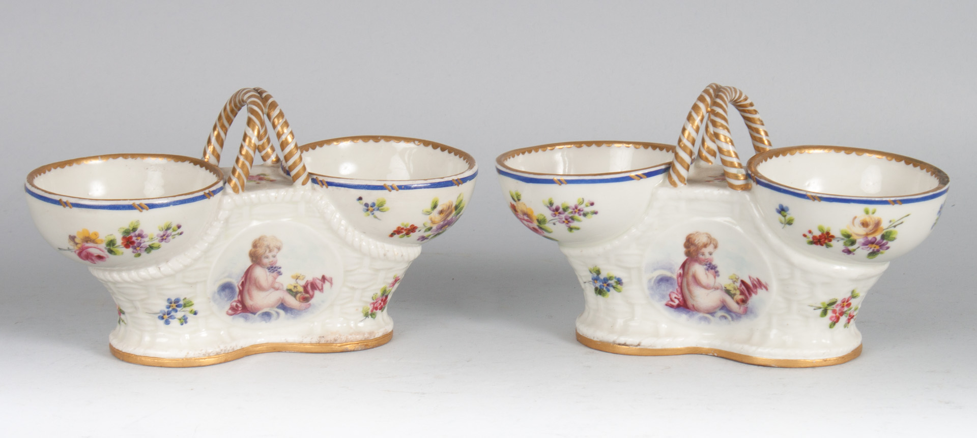 Appraisal: Pair of French porcelain master salts mid- th century modeled