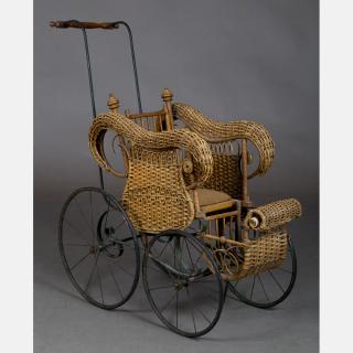 Appraisal: A Victorian Wicker and Metal Doll's Stroller th th Century