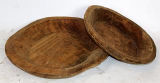 Appraisal: Pair of primitive wooden dough bowls Pair of primitive wooden