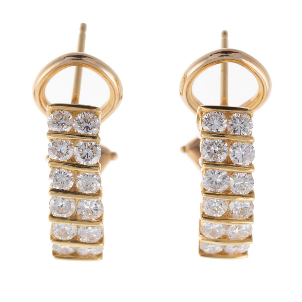 Appraisal: A Pair of Fine Channel Set Diamond Hoops in K