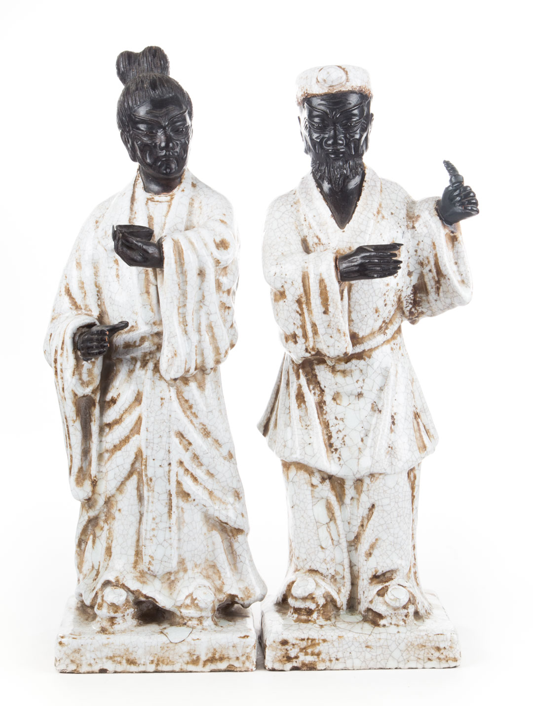 Appraisal: Pair of Italian Japanese style porcelain guardians each crackle glazed