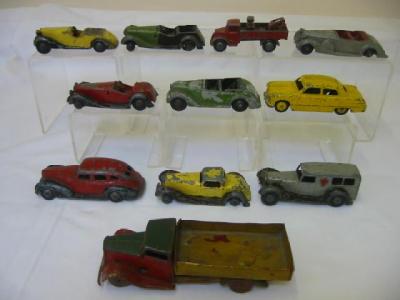 Appraisal: Eight early Dinky saloon and sports cars two commercial vehicles