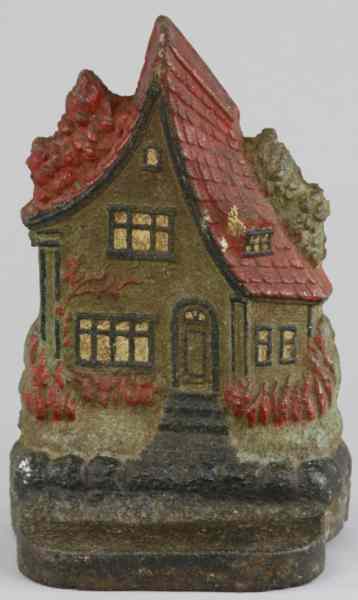 Appraisal: RARE COTTAGE DOORSTOP Depicts a quaint rustic cottage with stylized