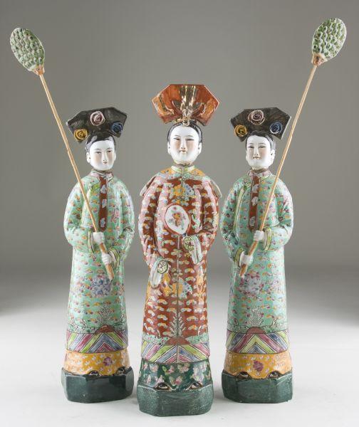 Appraisal: Set of Three Porcelain Nodder Figures ca hand- painted porcelain