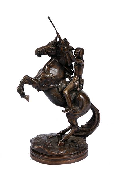 Appraisal: A patinated bronze figure of an Indian on a horse