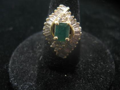 Appraisal: karat yellow gold emerald and diamond dinner ring th century