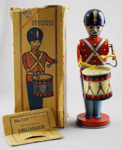 Appraisal: Chein Tin Wind-Up Drummer Toy Description Working Nice lithography Some