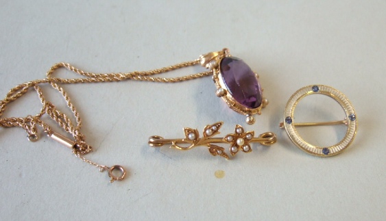 Appraisal: An amethyst and half pearl set pendant mounted with the