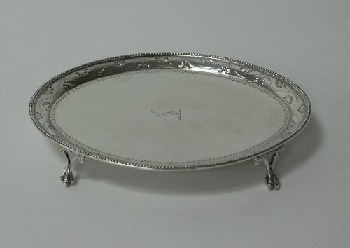 Appraisal: A George III silver teapot stand Robert Hennell London of