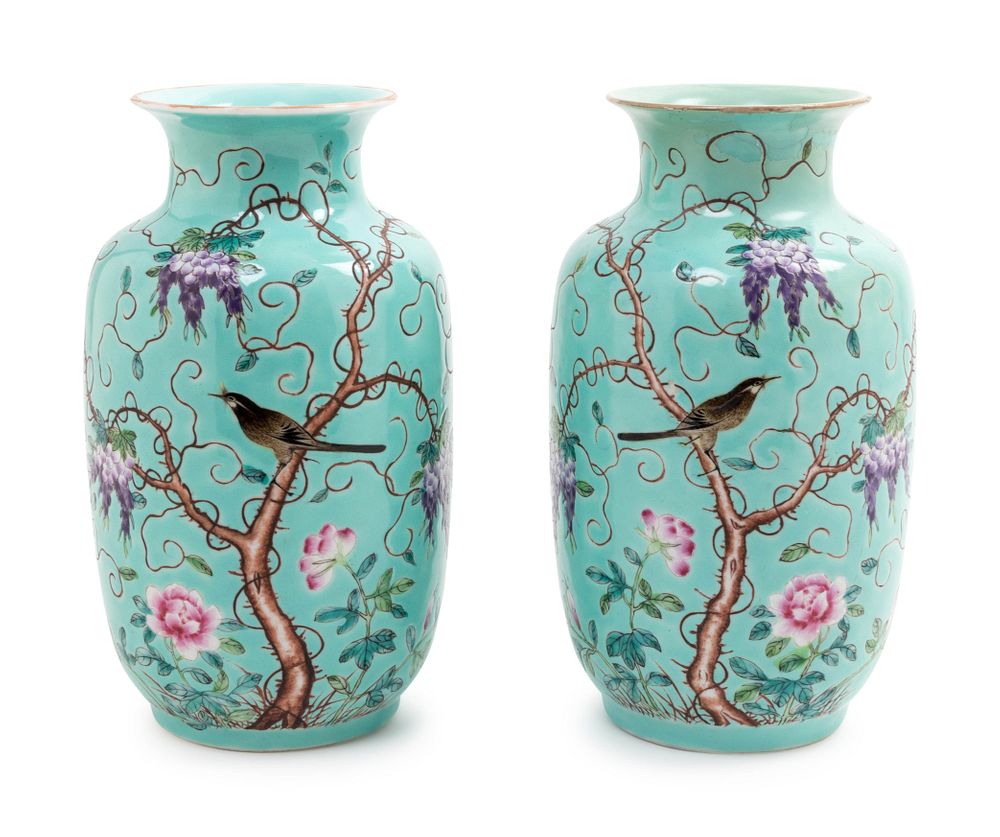 Appraisal: A Pair of Turquoise Ground Famille Rose VasesHeight of each