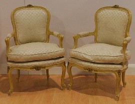 Appraisal: A pair of Louis XV style cream painted and upholstered