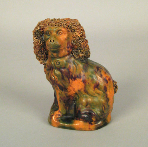 Appraisal: Pennsylvania redware spaniel bank ca attributed to Wagner Pottery with