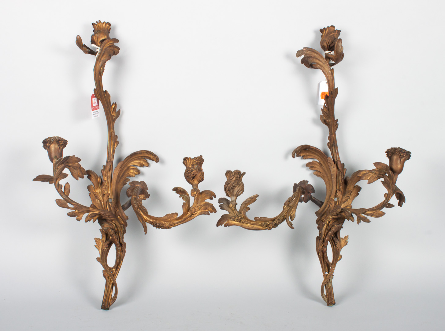 Appraisal: Pair of Louis XV style bronze sconces acanthus form with