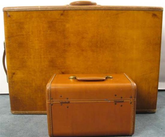 Appraisal: Two Samsonite Brown Leather Suitcases c s The larger suitcase