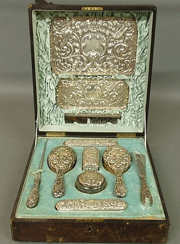 Appraisal: - Large ornate English silver dresser set in a monogrammed