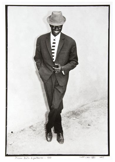 Appraisal: Malick Sidib b Karim Keita the Gentleman Gelatin silver print