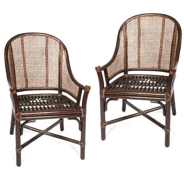 Appraisal: A group of two McGuire rattan tall back caned armchairs