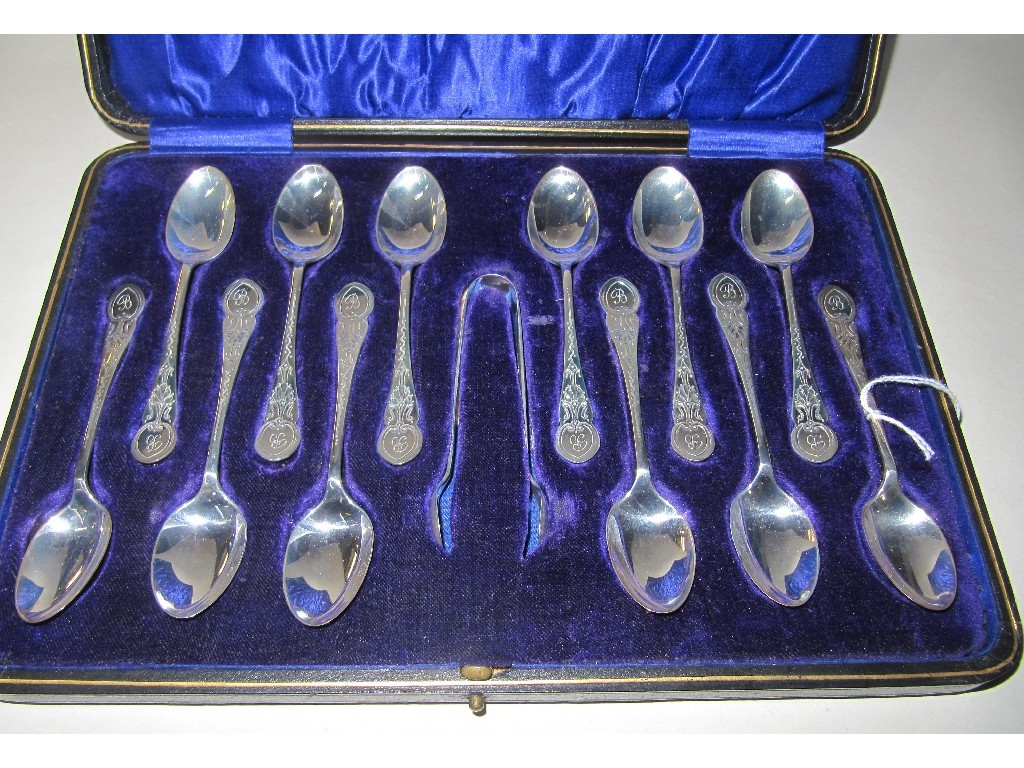 Appraisal: Cased set of twelve silver spoons with tongs Sheffield