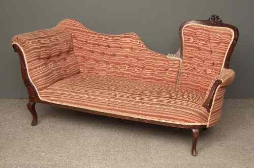 Appraisal: A Victorian mahogany framed three seat settee of shaped outline