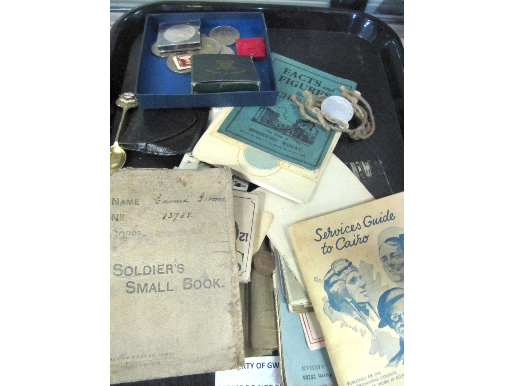 Appraisal: A lot comprising coins military booklets soldier's small book etc