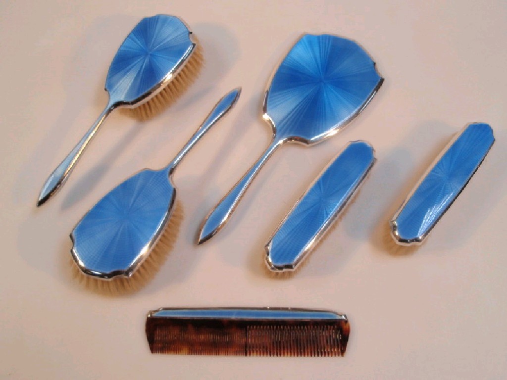 Appraisal: George VI silver and enamelled dressing table set comprising hand