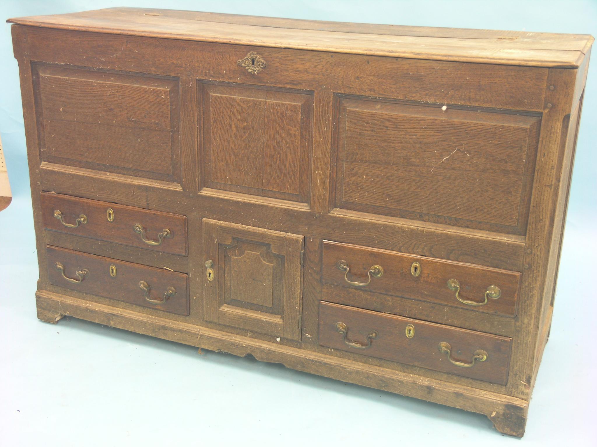 Appraisal: An early th century oak dowry chest fielded panel construction