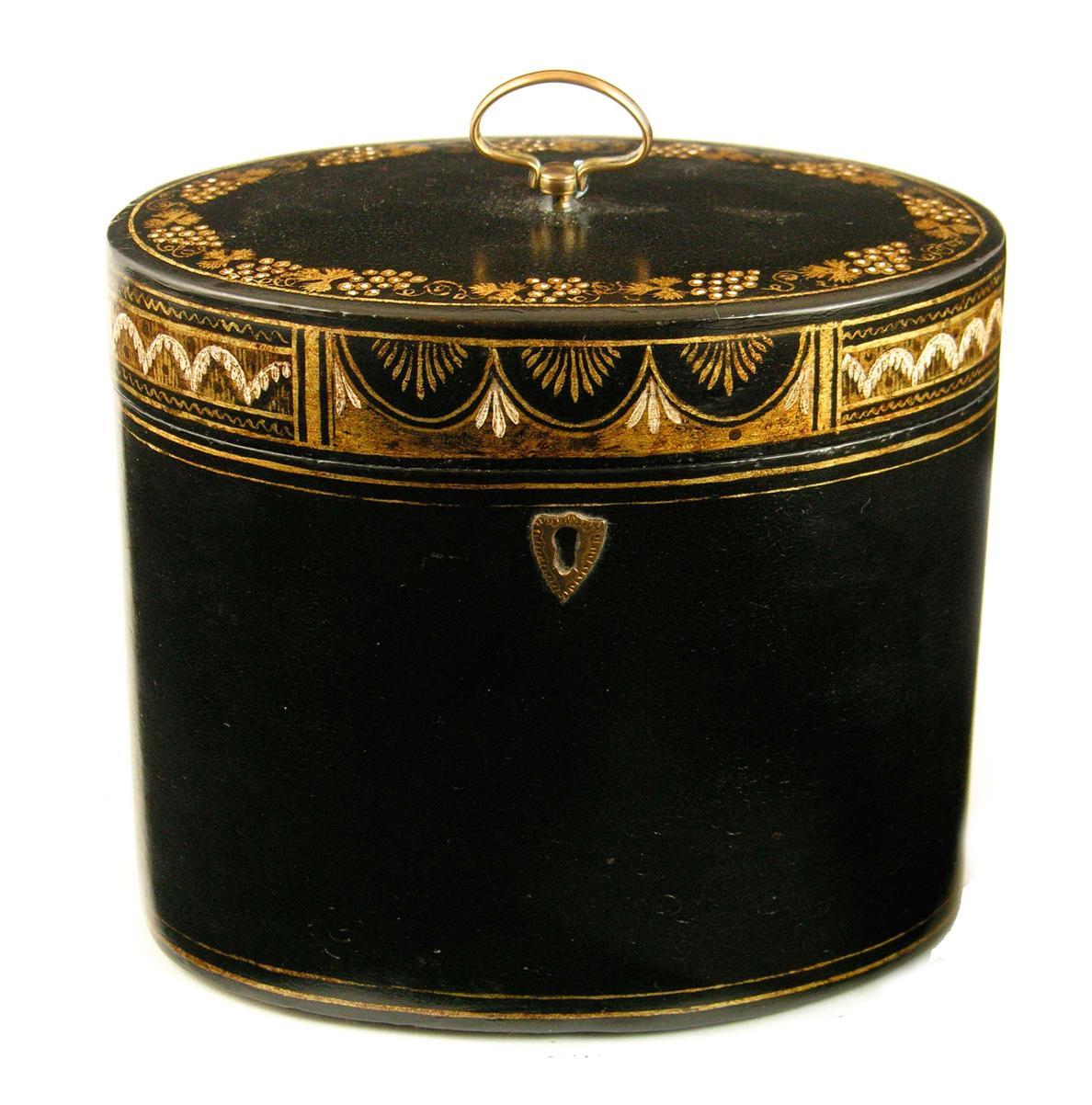 Appraisal: A George III papier-mache oval tea caddy