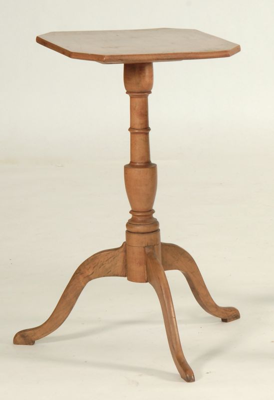 Appraisal: AMERICAN SHERATON-STYLE CANDLESTAND In maple with eight-sided top Vase-turned pedestal