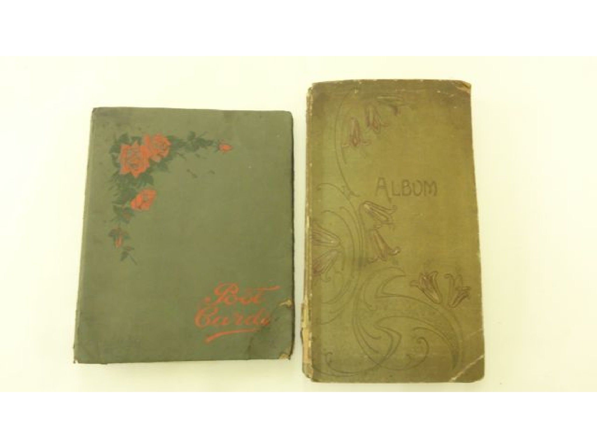 Appraisal: Two Edwardian postcard albums untouched containing a selection of local