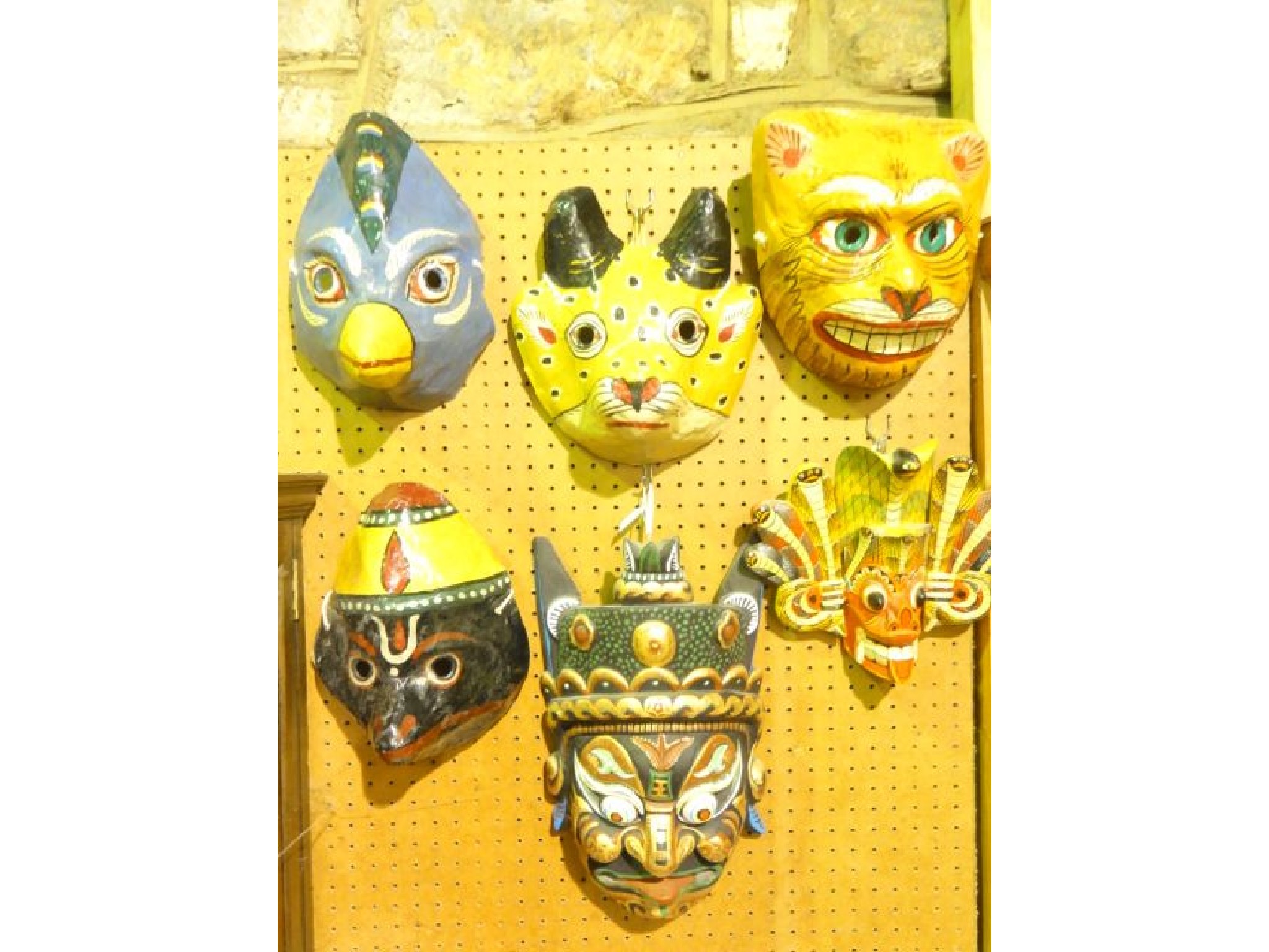 Appraisal: Four vintage eastern painted papier-mache masks with Zoomorphic details together