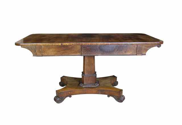 Appraisal: A Regency rosewood library table the rectangular top with rounded