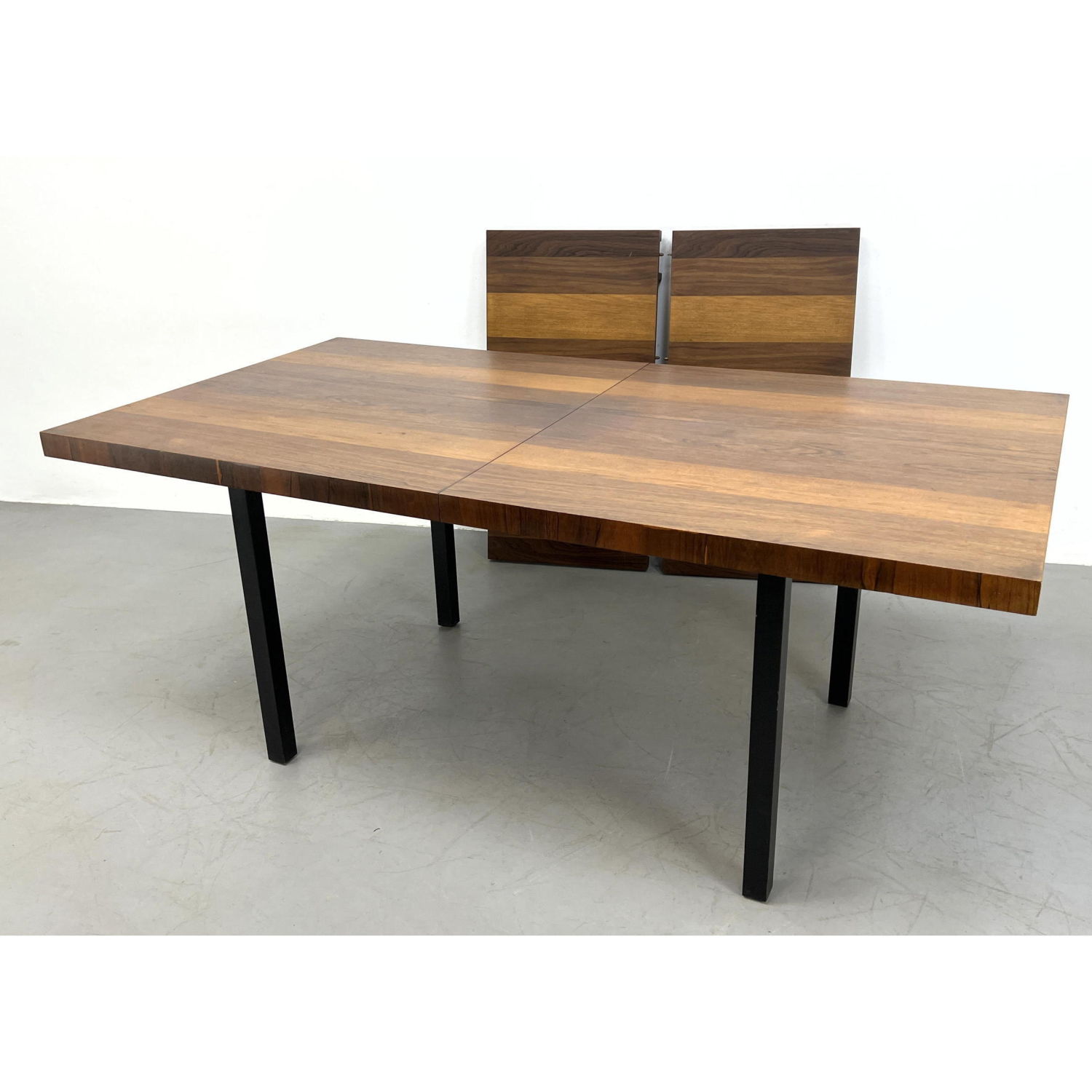 Appraisal: Milo Baughman Dining Table Ebonized legs Includes - inch leaves