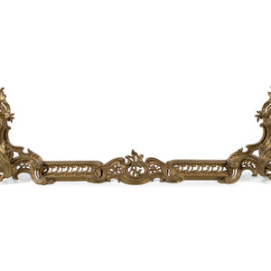 Appraisal: A Rococo Style Gilt Metal Fire Guard th Century comprising