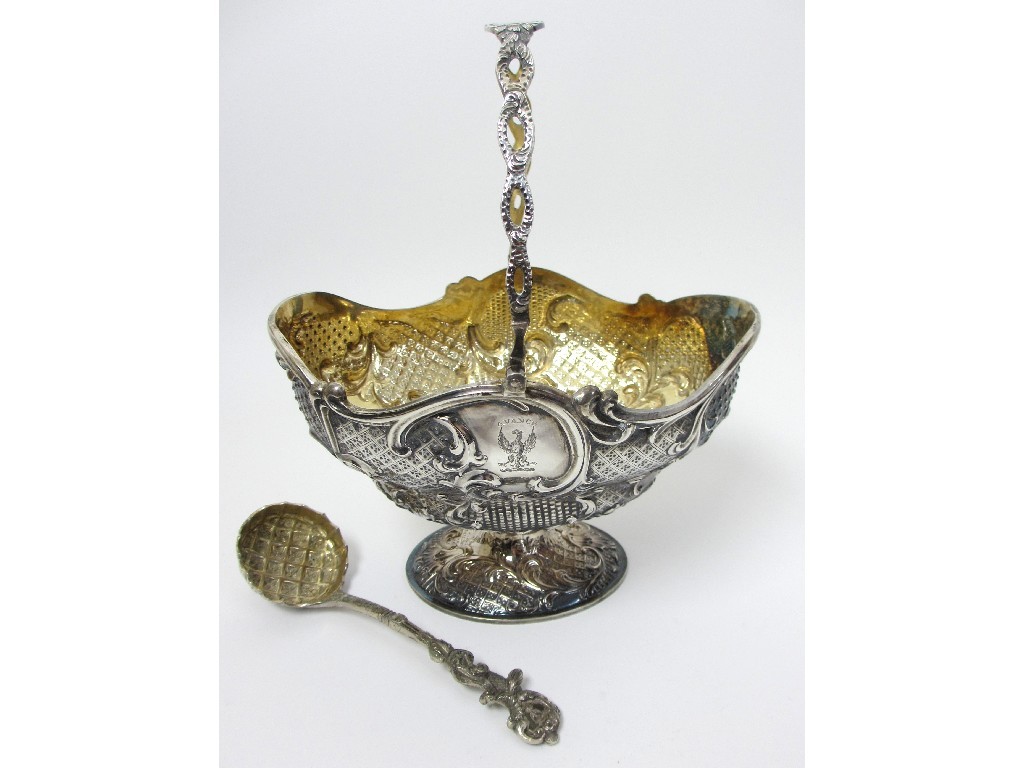 Appraisal: A late Victorian silver swing handled basket by Holland Aldwinckle