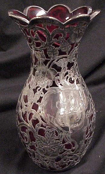 Appraisal: Sterling overlay large vase cranberry glass scalloped rim cracked glass