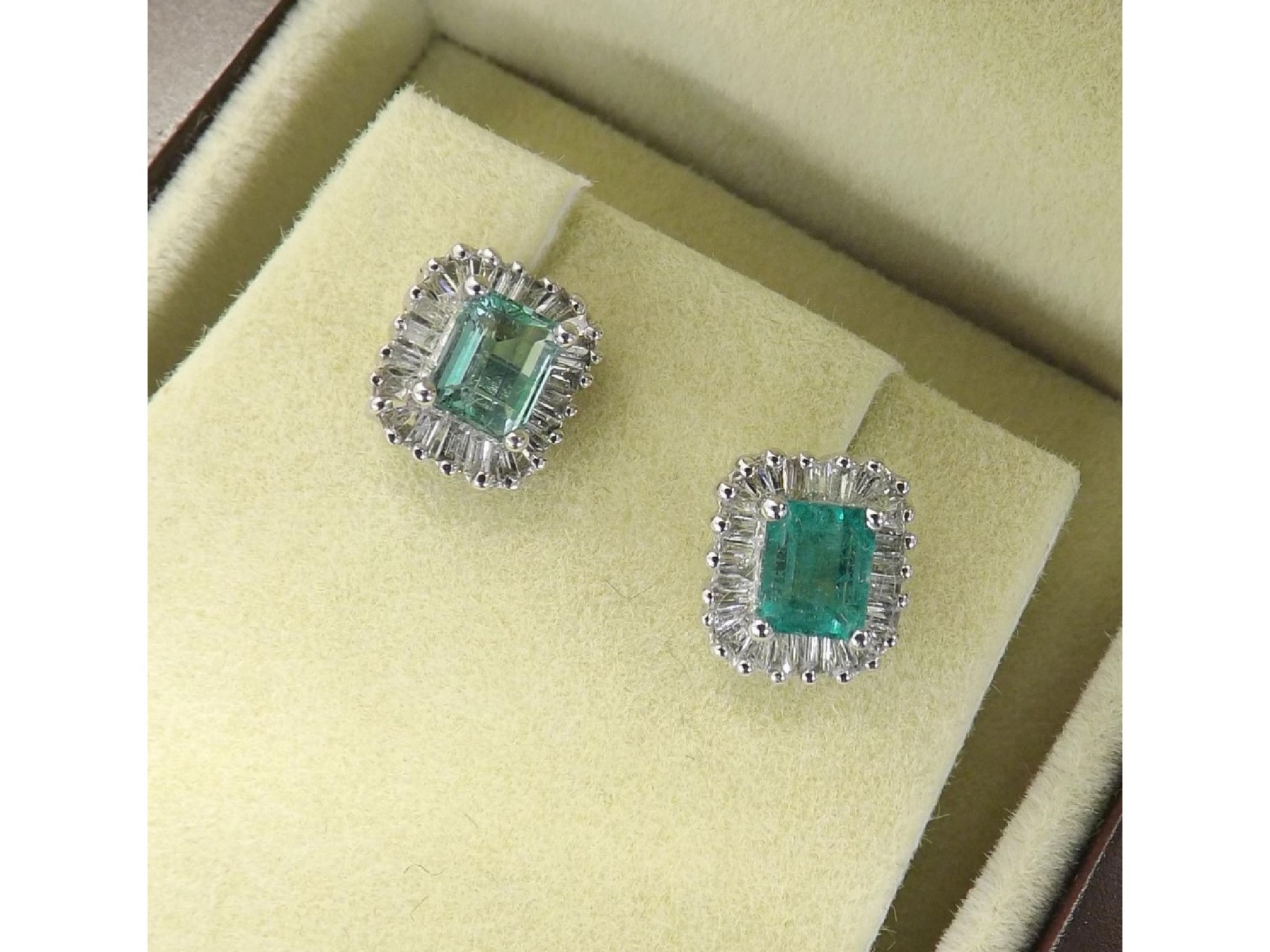 Appraisal: Pair of attractive ct emerald and diamond cluster earrings with