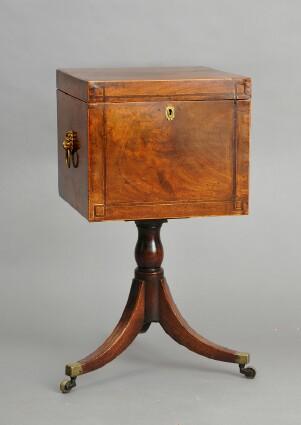 Appraisal: GEORGE III MAHOGANY CELLARET ON STAND The hinged top opening