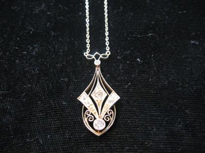 Appraisal: karat yellow gold and diamond pendant necklace Art Nouveau Seven