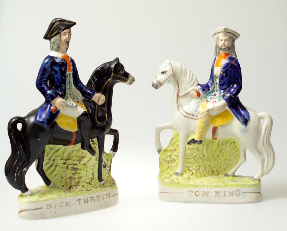 Appraisal: PAIR OF STAFFORDSHIRE FIGURES OF DICK TURPIN AND TOM KING