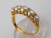 Appraisal: An carat gold carved half hoop untested pearl ring with