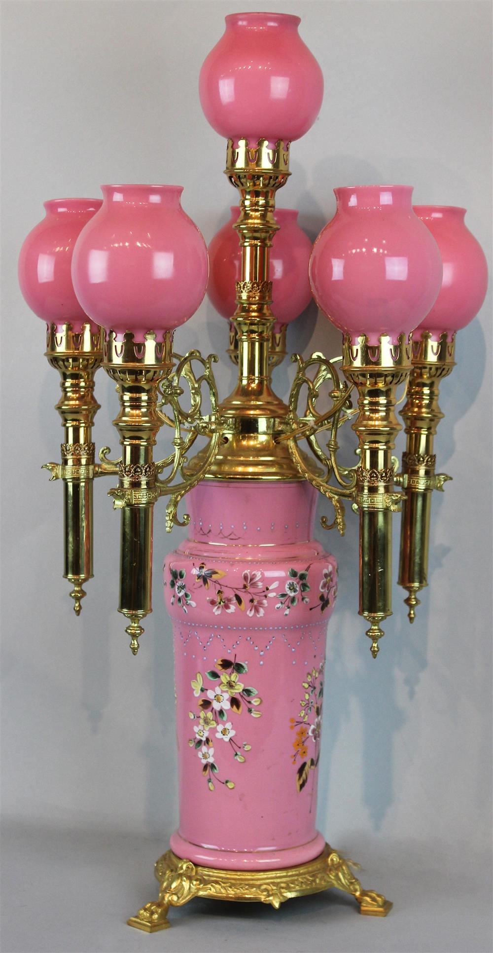 Appraisal: PINK BRISTOL VASE VICTORIAN LAMP WITH GLOBES with floral design