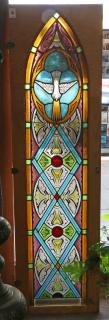 Appraisal: Ecclesiastical leaded glass window panel having a dove and quatrefoil