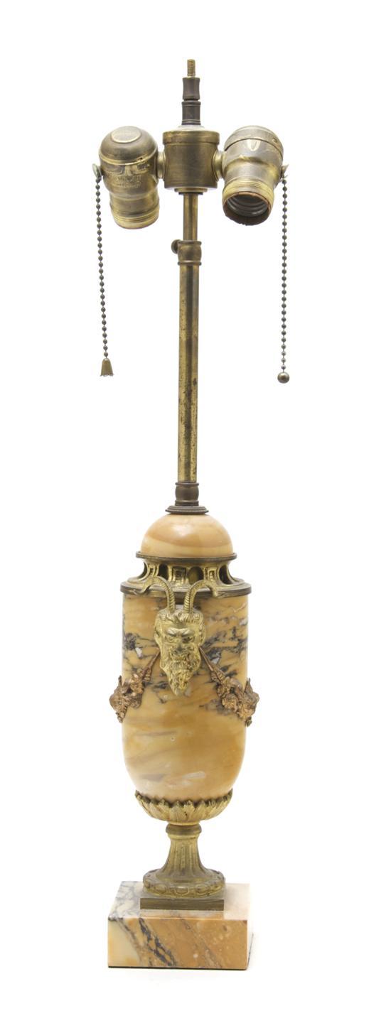 Appraisal: A Continental Marble and Gilt Metal Mounted Urn having ram