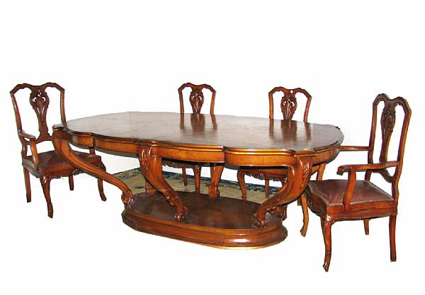 Appraisal: An English eleven piece dining suite comprising a dining table